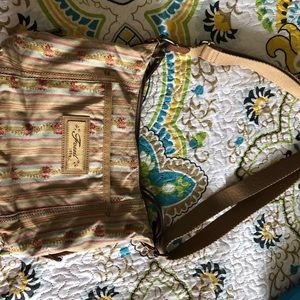 Fossil crossbody purse cotton. 11 inches wide 8 inches tall. Drop down strap.